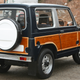 Illustration for article titled This Jeep Grand Wagoneer-ified Suzuki Jimny Is Cute and Wonderful and for Sale
